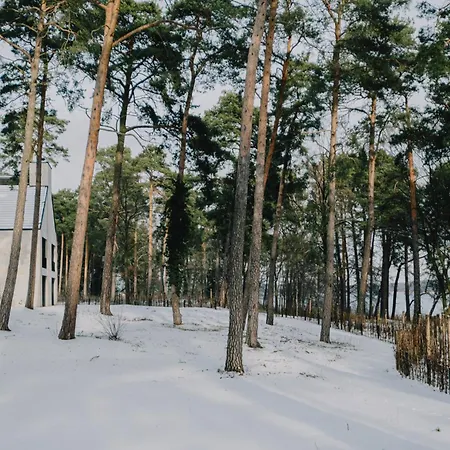 شقة Thechipp - Designapartment Mit Seeblick, Pool, Sauna & Kamin