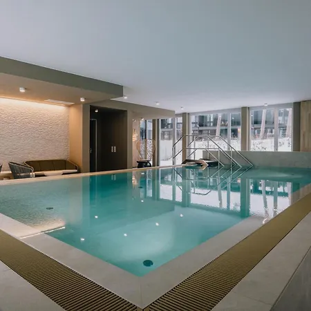 Апартаменты Thechipp - Designapartment Mit Seeblick, Pool, Sauna & Kamin *